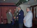 Robert is welcomed to the Club by Pres.David & Vice Pres. Lew